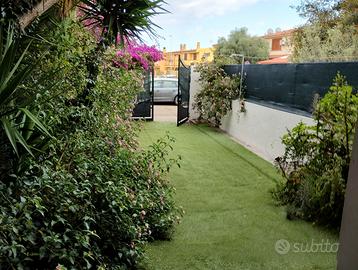Villetta a schiera 8.p.l. 2 bagni giardino,cortile