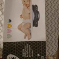 Bilancia neonato e sterelizzatore