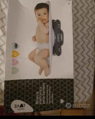 Bilancia neonato e sterelizzatore