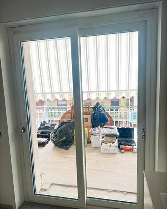Infissi SCHUCO PVC scorrevoli bianco effetto legno