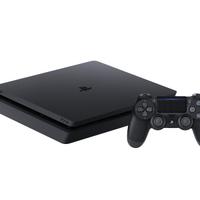 PS4 CON CARICATORE, CUFFIE E UN JOYSTICK