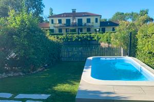 Appartamento al piano terra con piscina