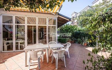 TRILOCALE CON GIARDINO E POSTO AUTO