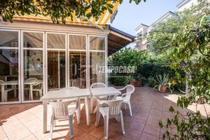 TRILOCALE CON GIARDINO E POSTO AUTO