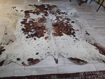 tappeto  grande vera pelle di toro di Normandia