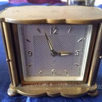 Orologio JAZ con porte a scomparsa