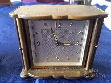 Orologio JAZ con porte a scomparsa