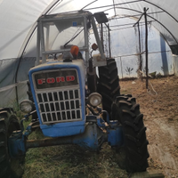 Trattore ford 3000 con fresa motozappa e spargicon