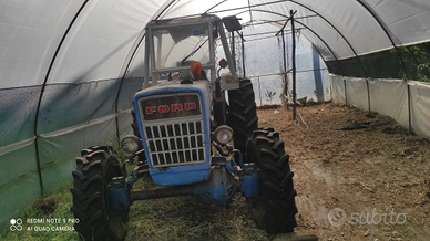 Trattore ford 3000 con fresa motozappa e spargicon