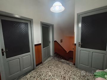 Porta in legno con vetro n.4 porte