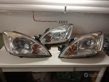 Fanali  + accessori Mitsubishi Lancer SW 2004