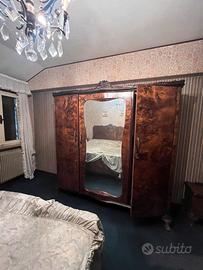 Camera matrimoniale legno radica