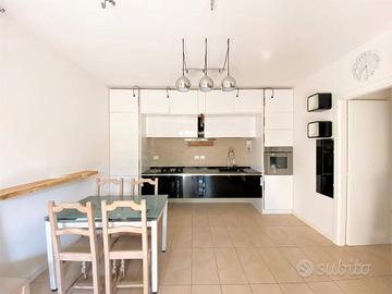 Trilocale con giardino