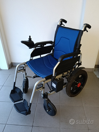 Carrozzina elettromeccanica pieghevole, modello "A