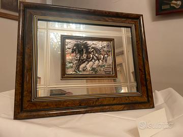 Cavalli in argento. Quandro in bassorilievo.