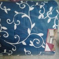 Trapunta e lenzuola matrimoniale