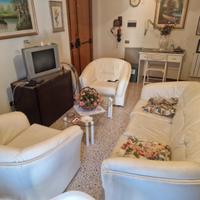 poltrona divano e porta tv