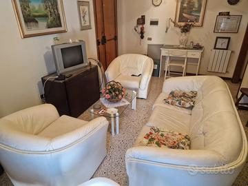 poltrona divano e porta tv