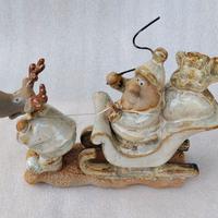 Babbo Natale su slitta trainata da una renna