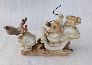 Babbo Natale su slitta trainata da una renna