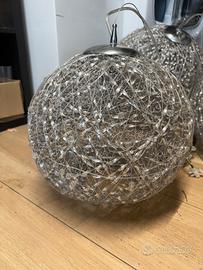 3 lampadari argentati di diverse misure