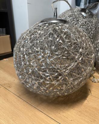 3 lampadari argentati di diverse misure