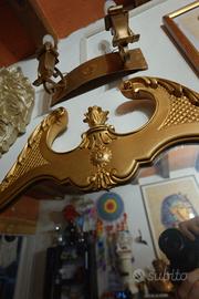 Specchio stile antico con cornice color dorato