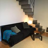 Divano in pelle e tessuto