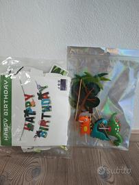 decorazioni torta e festone dinosauri