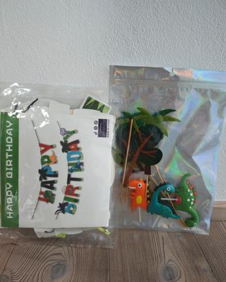 decorazioni torta e festone dinosauri