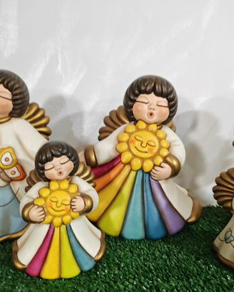 Coppia angeli arcobaleno thun
