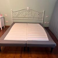 Letto matrimoniale con testiera