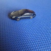 Modellino Porche 911 carrera 1:64 Maisto