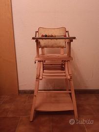vecchio seggiolone per bambini