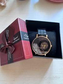 Orologio dona elegante nero e oro