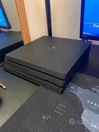 Ps4 Pro con giochi,scatola, due pad