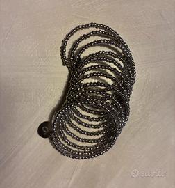 Bracciale Biblo in argento che si allunga sul brac