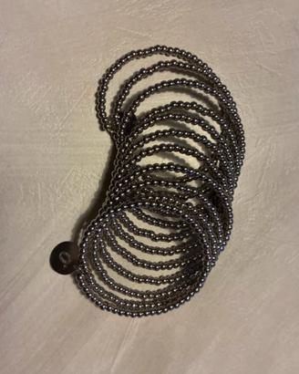 Bracciale Biblo in argento che si allunga sul brac