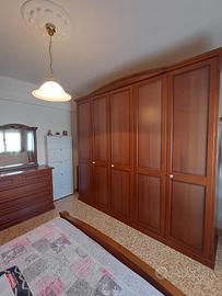 camera da letto in legno stile arte povera
