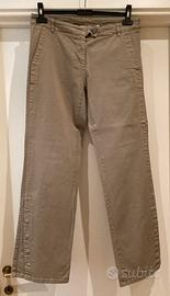 Pantaloni beige con spacchi