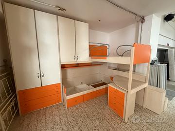 Cameretta a soppalco angolare