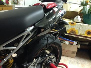 Supporti borse laterali