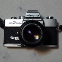 Minolta srt 303 b con obiettivo 50 mm