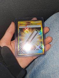 carta oro pokemon 121/111