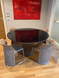 Set tavolo rotondo e 4 sedie Roche Bobois
