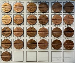 25 gettoni telefonici. 1 con errore di conio.