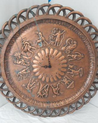 Orologio in rame con scene rurali