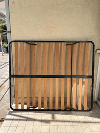 Rete matrimoniale con piedi pieghevoli