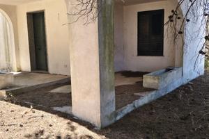Terreno con appartamento