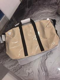 Borsa da viaggio Rains Hilo Weekend beige/crema